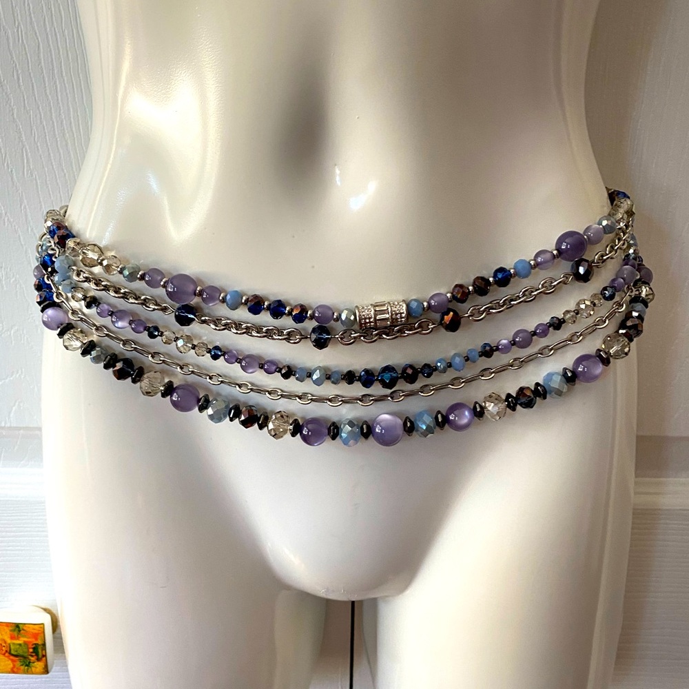White House Black Market chain belt. Lots of blues. Fits small or medium.